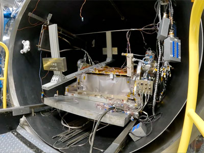 Time-lapse video of PACE Tilt mechanism moving inside the Thermal Vacuum chamber at NASA Goddard Space Center. Credit: Henry, Dennis (Denny)