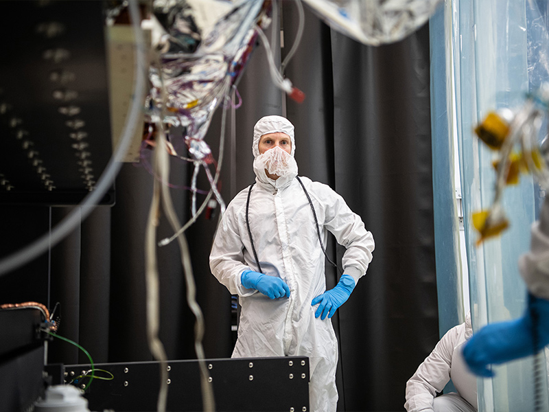 Quality Assurance (QA) Engineer Brad Weideman witnesses the OCI ETU hardware installation.
