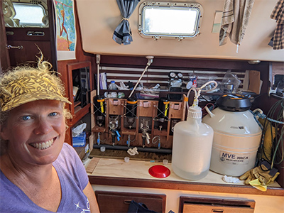 Bridget Seegers (NASA GSFC), captain and platform scientist on the R/V Blissfully, demonstrates the ship laboratory, during operations off Long Beach, CA.
