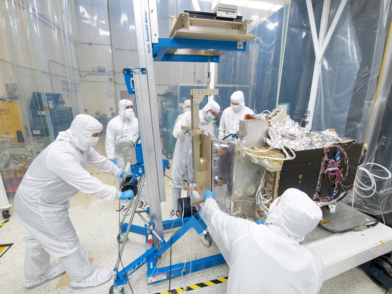Technicians mechanically integrate the Shortwave Infrared (SWIR) Detector Assembly into the Ocean Color Instrument Engineering Test Unit. Credit: Stover, Desiree