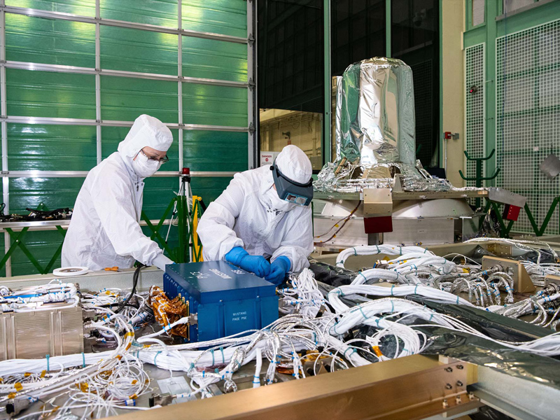 Performing electrical integration of flight power system electronics and engineering test unit’s command and data handling attitude control electronics box.