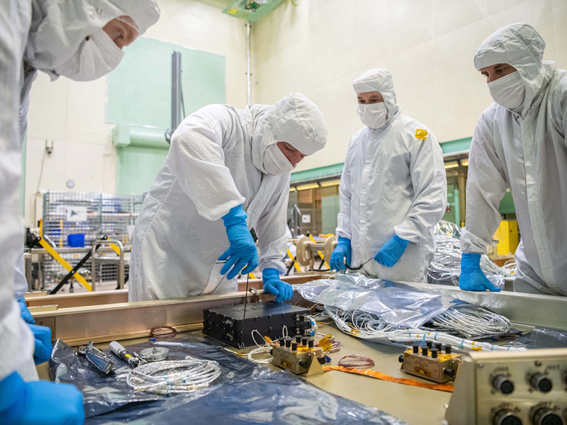Installing tilt and solar array drive electronics to a PACE spacecraft panel (-Y).