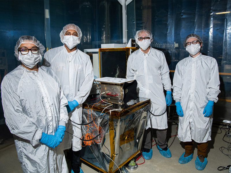 Group photo with HARP2 polarimeter. Credit: Henry, Dennis (Denny)