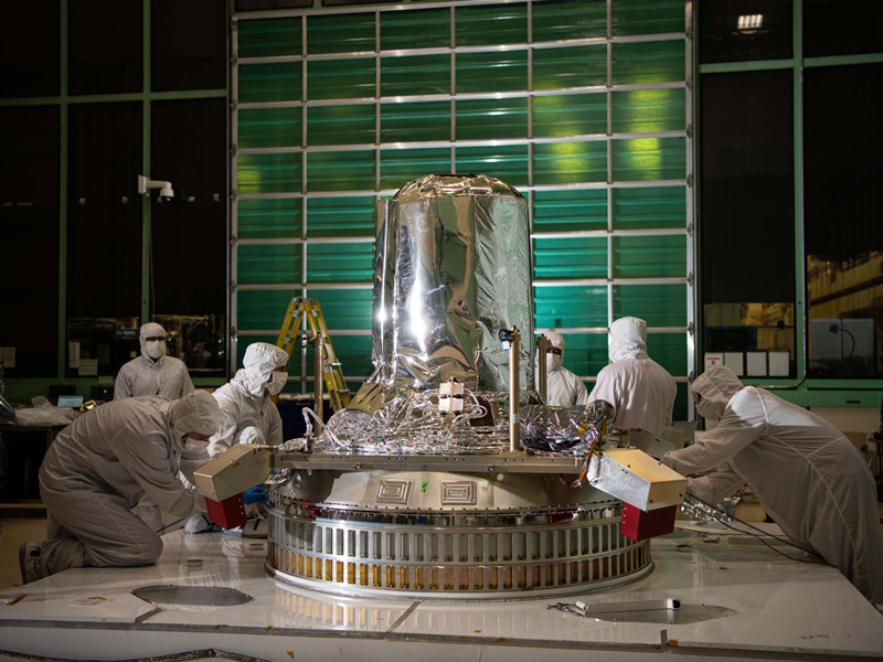 Installing the passive ring and propulsion module onto the PACE observatory dolly.