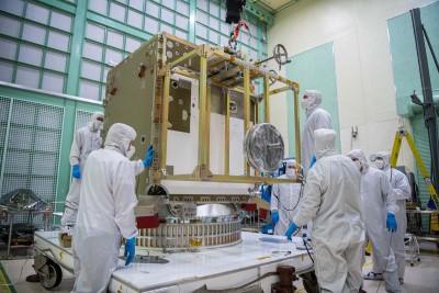Assembling PACE spacecraft bus structure.