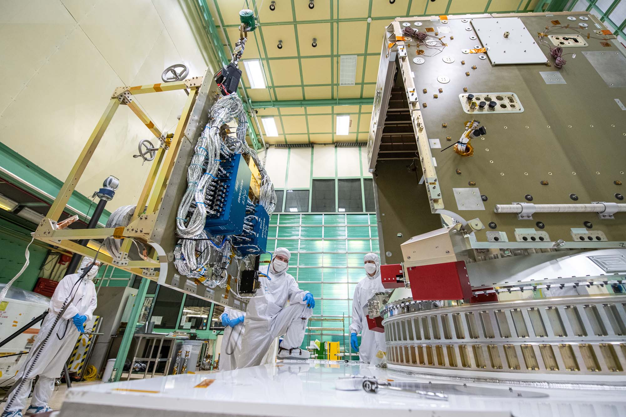 Installing panel (+Y) on the PACE spacecraft bus.