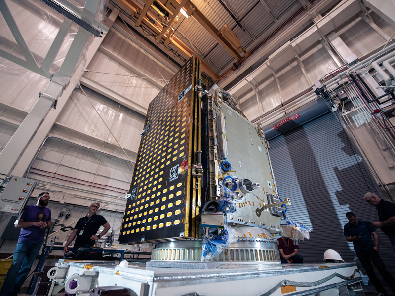 Lifting PACE Structural Verification Unit onto Aronson Table for engineering tests.
