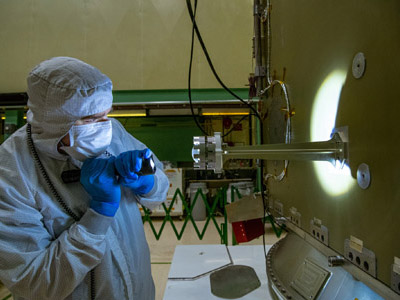 Installing Low Gain Antenna on PACE Spacecraft bus.