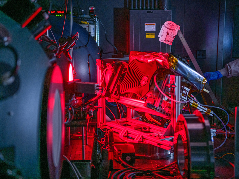 TV/TB Test of HARP2 Instrument; HARP2 calibration testing Setup with red light stills and video. Credit: NASA