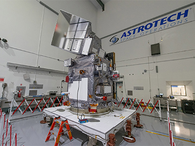 PACE Observatory on Dolly at Astrotech during Launch Campaign. Launch Site integration and test: Lift Observatory to Aronson Table. Lift Back to Observatory Dolly. Credit: NASA