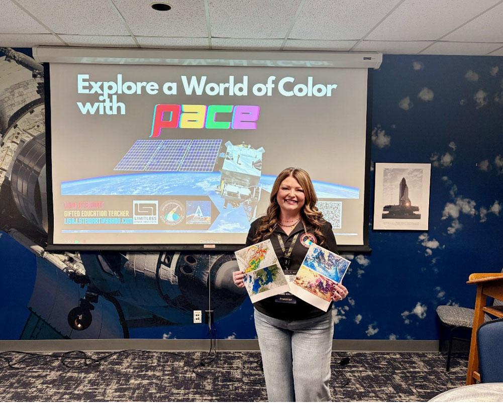 Teacher holding up PACE images