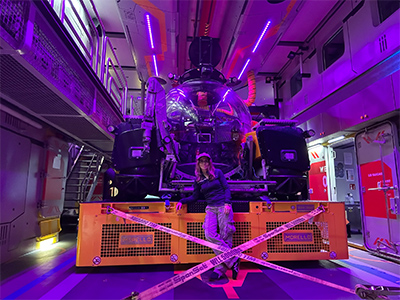 Maria Tzortziou in front of an OceanXplorer deep sea vehicle.