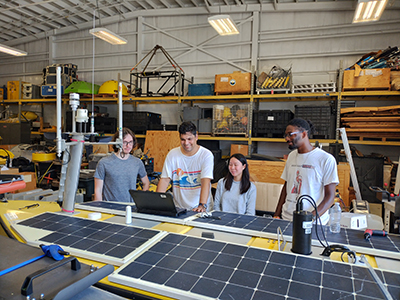 Students of Xiaodong Zhang (Univ. Southern Mississippi) work on SeaTrac uncrewed surface vehicle.