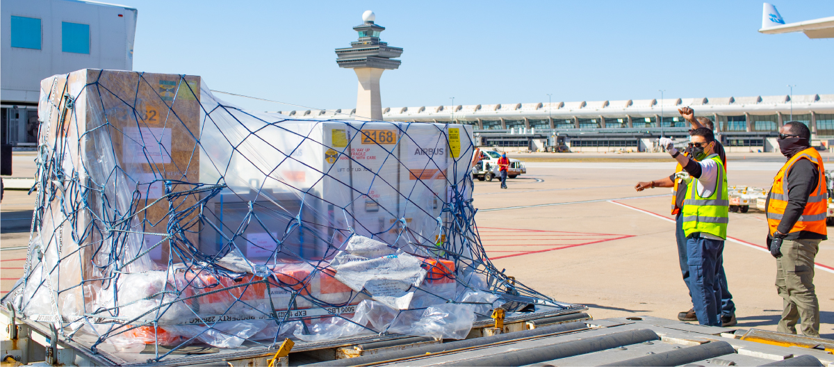 The SPEXone instrument is delivered and taken off the plane at Dulles International Airport