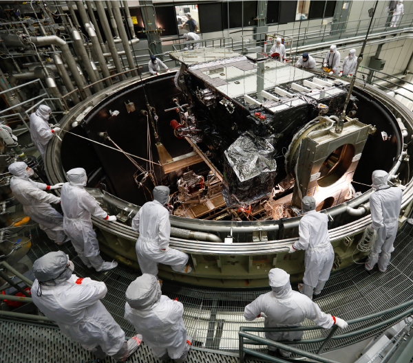 NOAA’s GOES-S satellite is lifted into a thermal vacuum chamber to test its ability to function in the cold void of space
