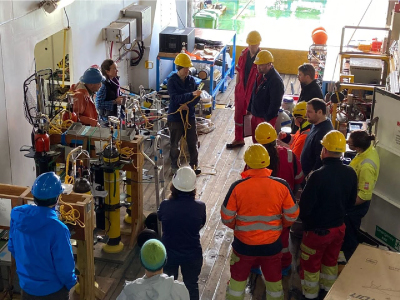 Scientists aboard the RRS <em>James Cook</em> prepare a test deployment of sediment traps. Credit: Lee Karp-Boss