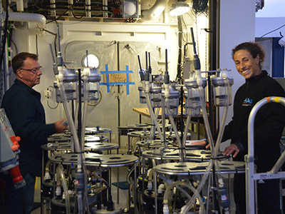 Steve Pike and Claudia Benitez-Nelson prepare filtration pumps for deployment