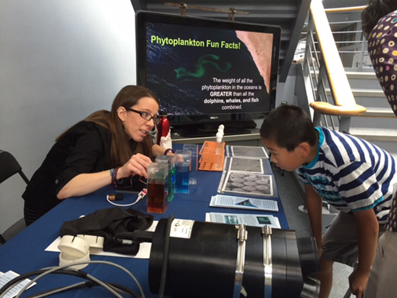 Aimee Neeley demos the "Little Bits" ocean color activity. Credit: Bryan Franz (NASA/GSFC)