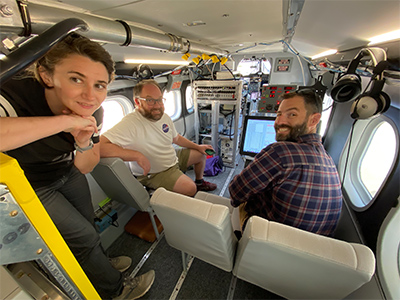 Cecile Carlson (NOAA CS, LiNeph), Luke Ziemba (NASA LaRC, LARGE), and Adam Ahern (NOAA CS, LiNeph) onboard the CIRPAS Twin Otter, Marina, CA.