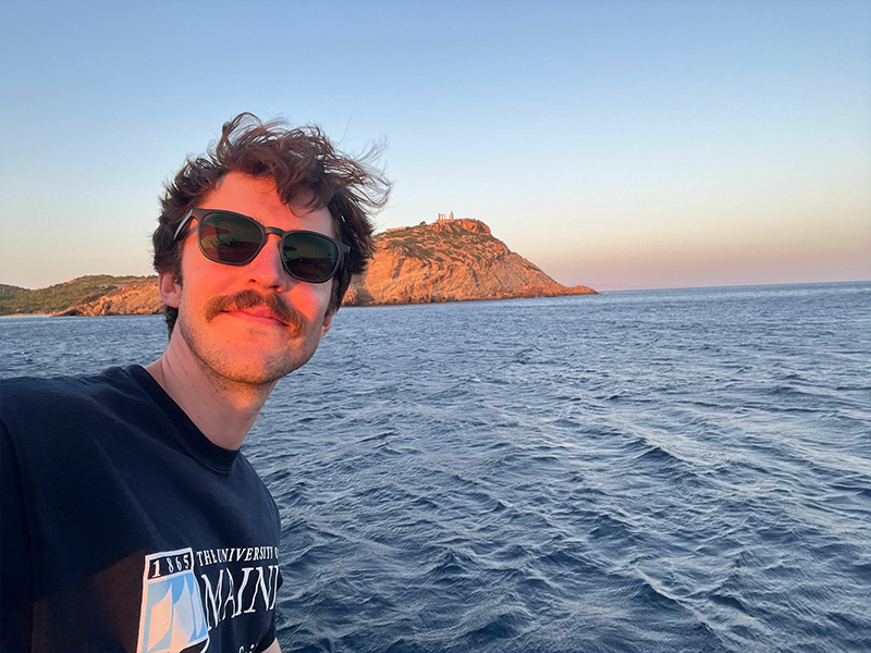 Patrick Gray with Temple of Poseidon