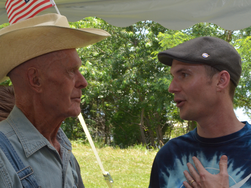 Goddard oceanographer Lachlan McKinna speaks with Bernie Fowler, a retired state senator and creator of the "Sneaker Depth" measurement. Credit: NASA GSFC
